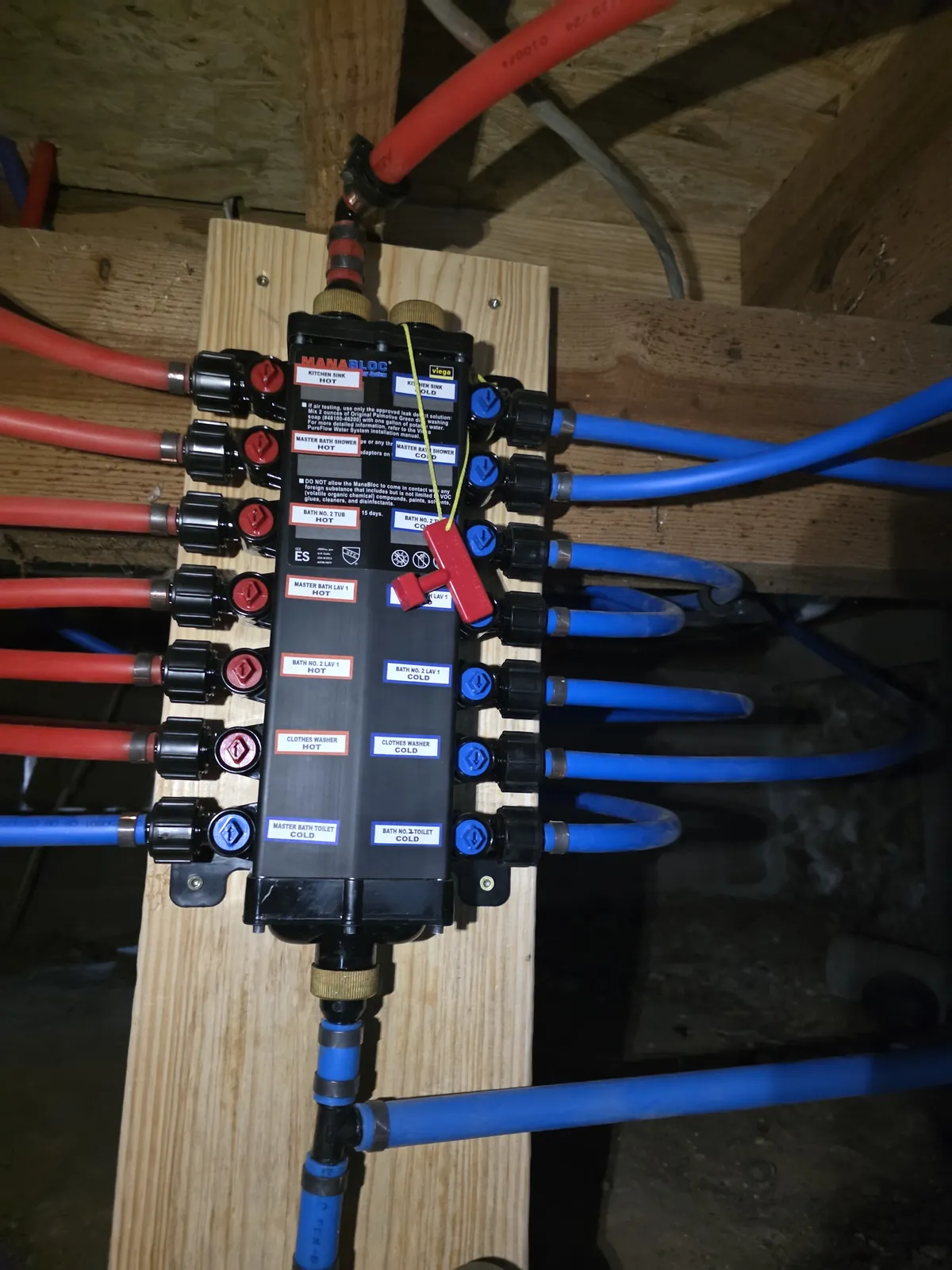 PEX manifold installation labeled by fixture by Grizzly Plumbing